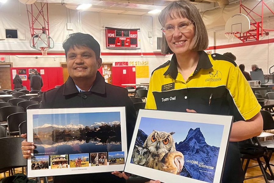 Owl center director karla - bloem- riciving token of love-by krishna mani baral